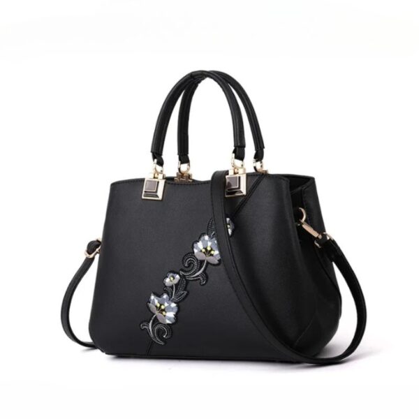 Sac à main noir chic avec bandoulière amovible