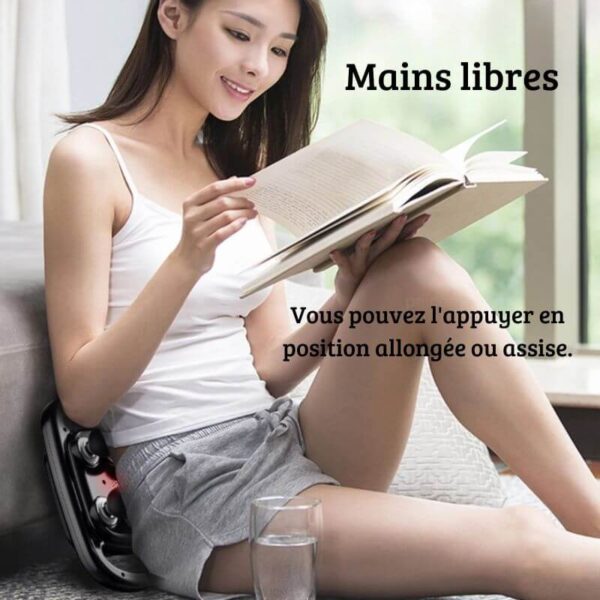Pistolet de massage en action sur le dos